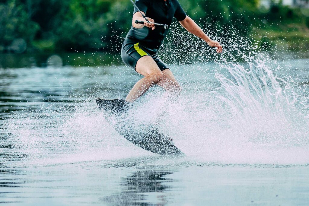 man jumps on wakeboard wave sm 1